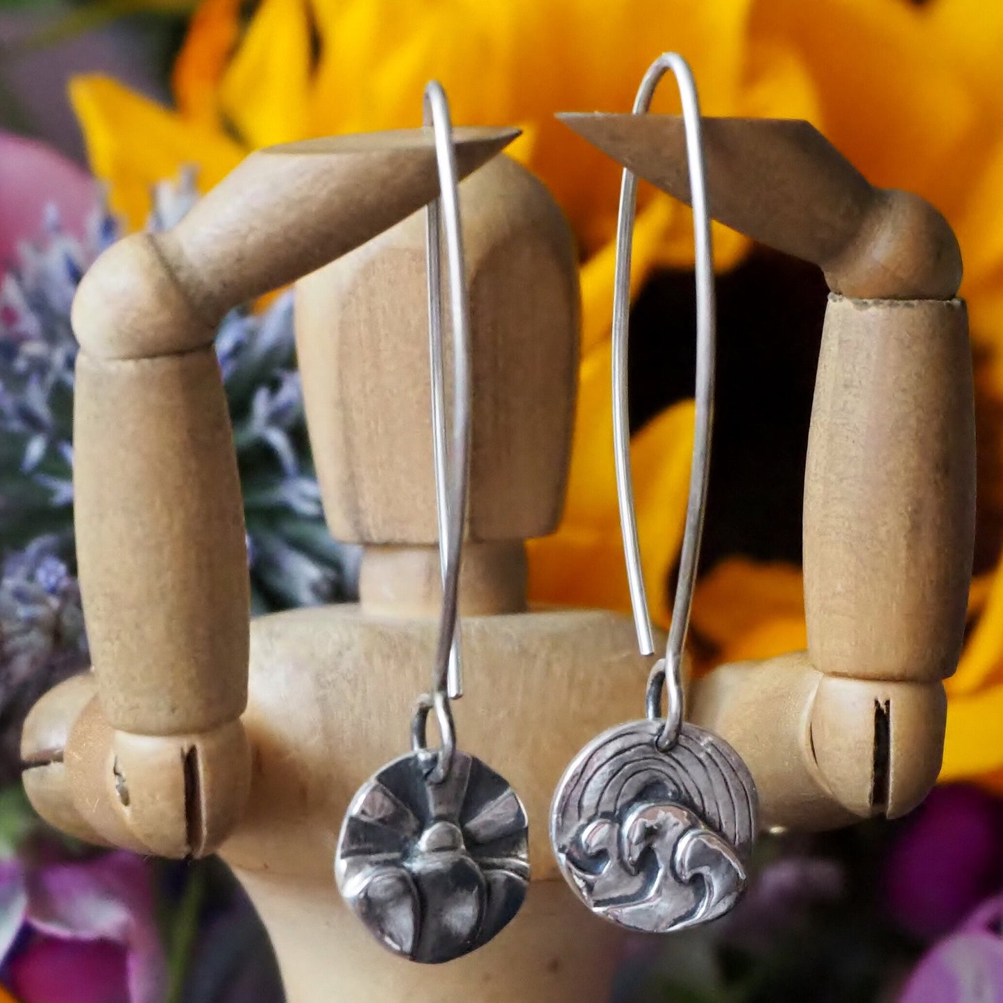 A beautiful pair of handmade fine silver sun, rainbow, waves and cloud earrings on long 925 sterling silver wires