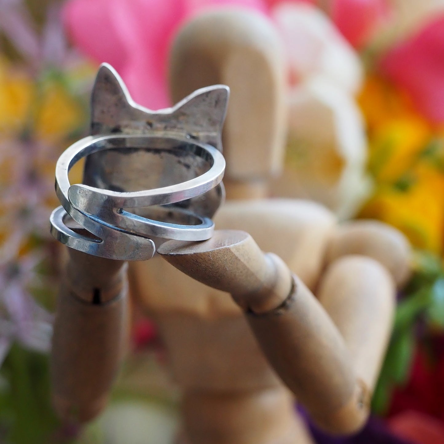A beautiful Fox head ring made from eco friendly fine silver with an adjustable sterling silver band.