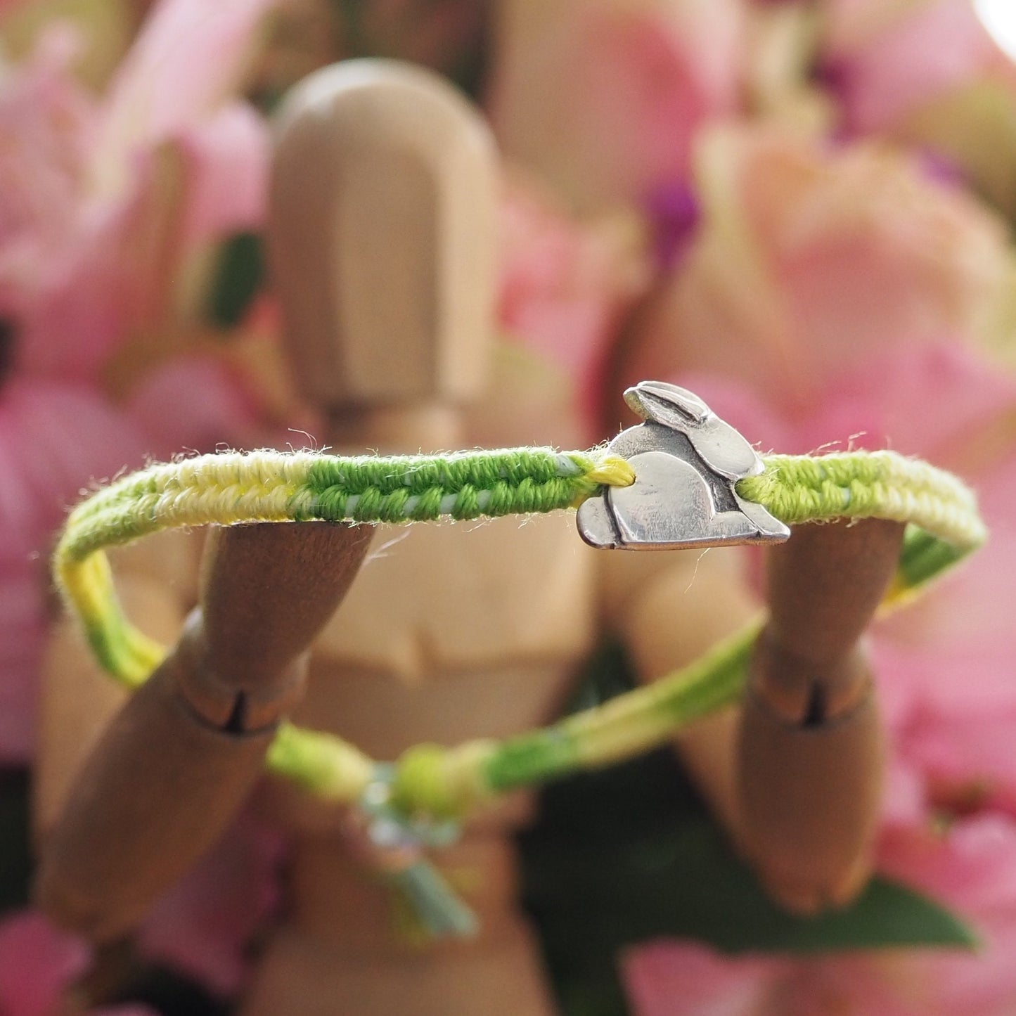 A gorgeous tiny bunny rabbit hand made in fine silver on a beautiful greeny leather, cotton and sterling silver friendship bracelet.