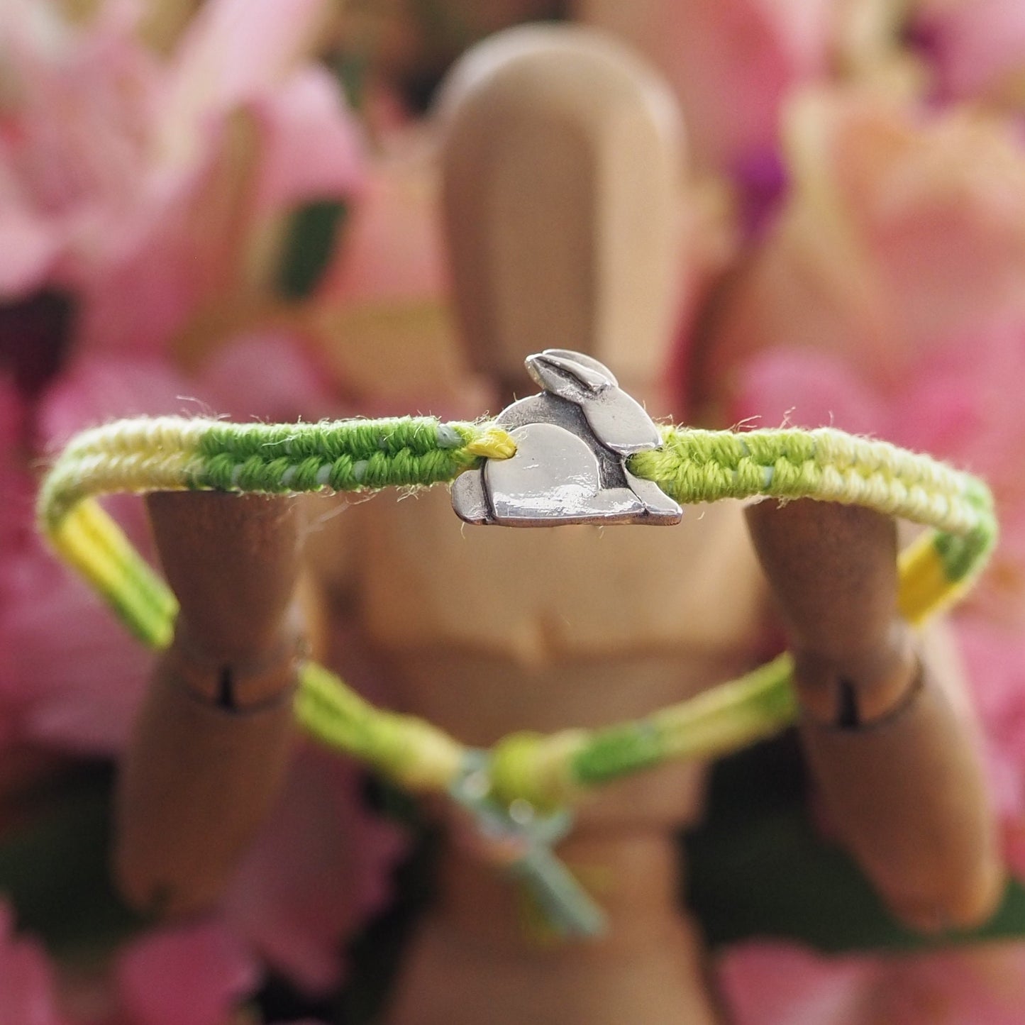 A gorgeous tiny bunny rabbit hand made in fine silver on a beautiful greeny leather, cotton and sterling silver friendship bracelet.