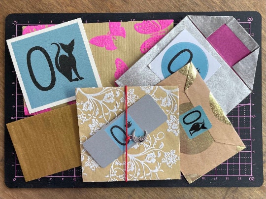 A lovely little pair of handmade fine silver bee earrings highlighted with 24k gold on hand formed sterling silver wires.