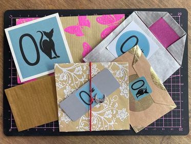 A gorgeously simple fine silver pair of handmade angel and devil wings necklace on a sterling silver chain.