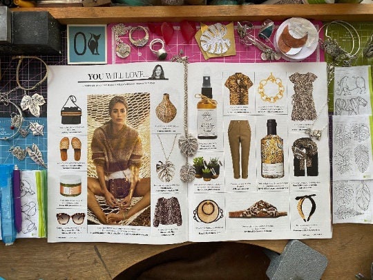 A gorgeous tiny handmade sterling silver layered heart pendant on a sterling silver chain finished off with a gemstone clip.