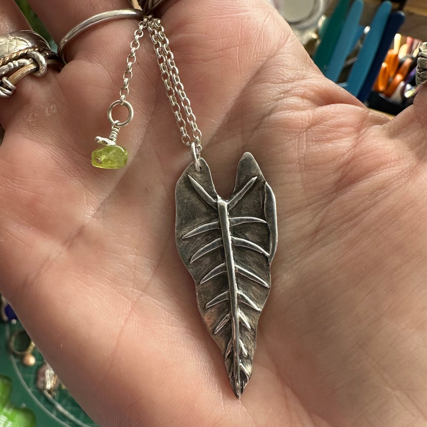 A gorgeous unique philodendron leaf handmade in eco friendly fine silver on a sterling silver necklace.