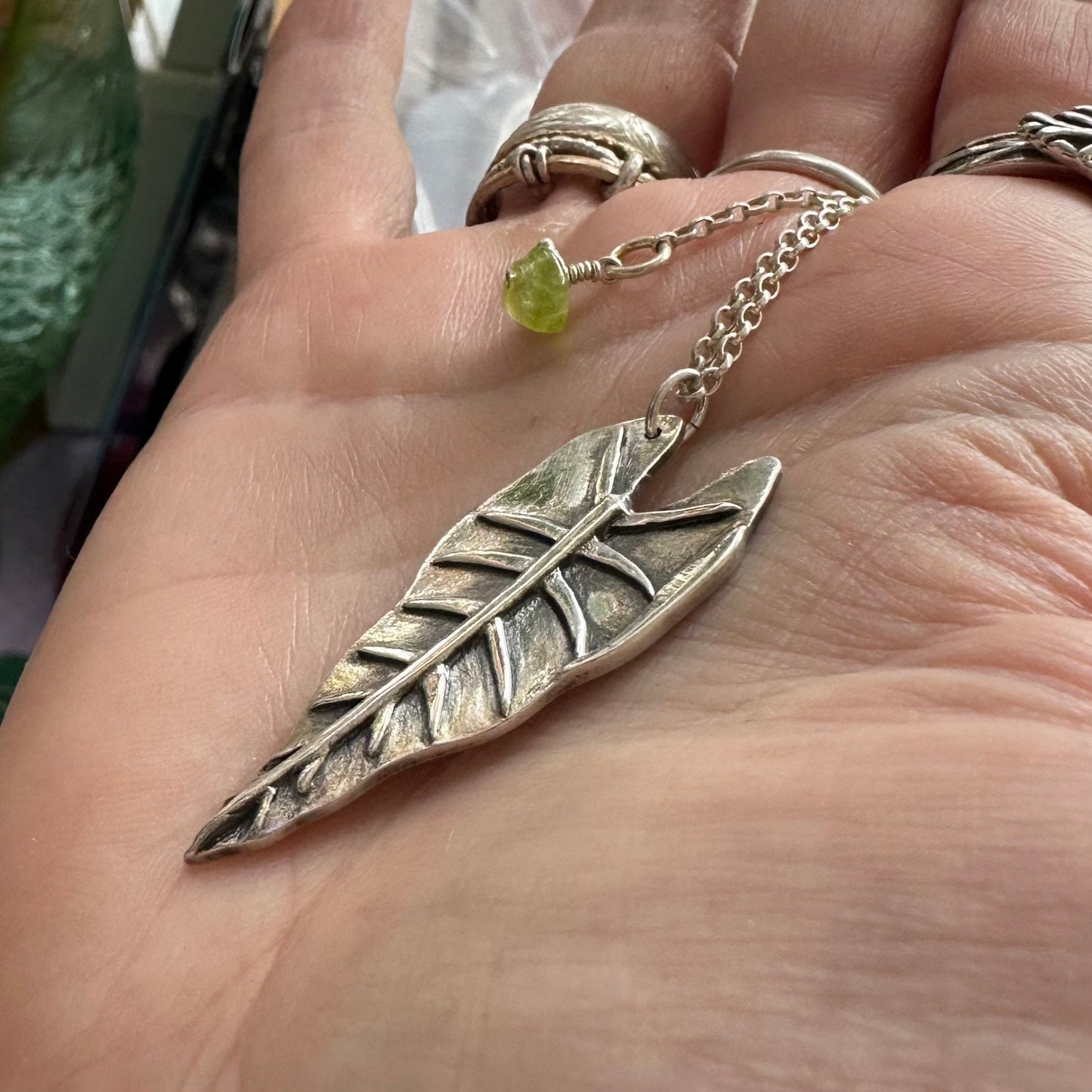 A gorgeous unique philodendron leaf handmade in eco friendly fine silver on a sterling silver necklace.