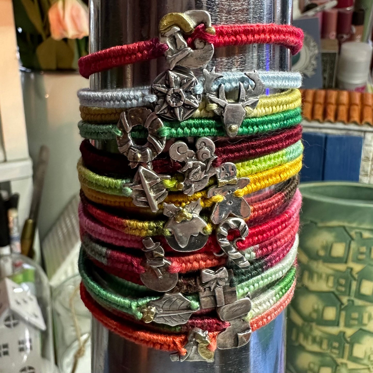 A handmade fine silver gingerbread man with a gold bow tie on a lovely yellow leather, cotton and sterling silver woven friendship bracelet…