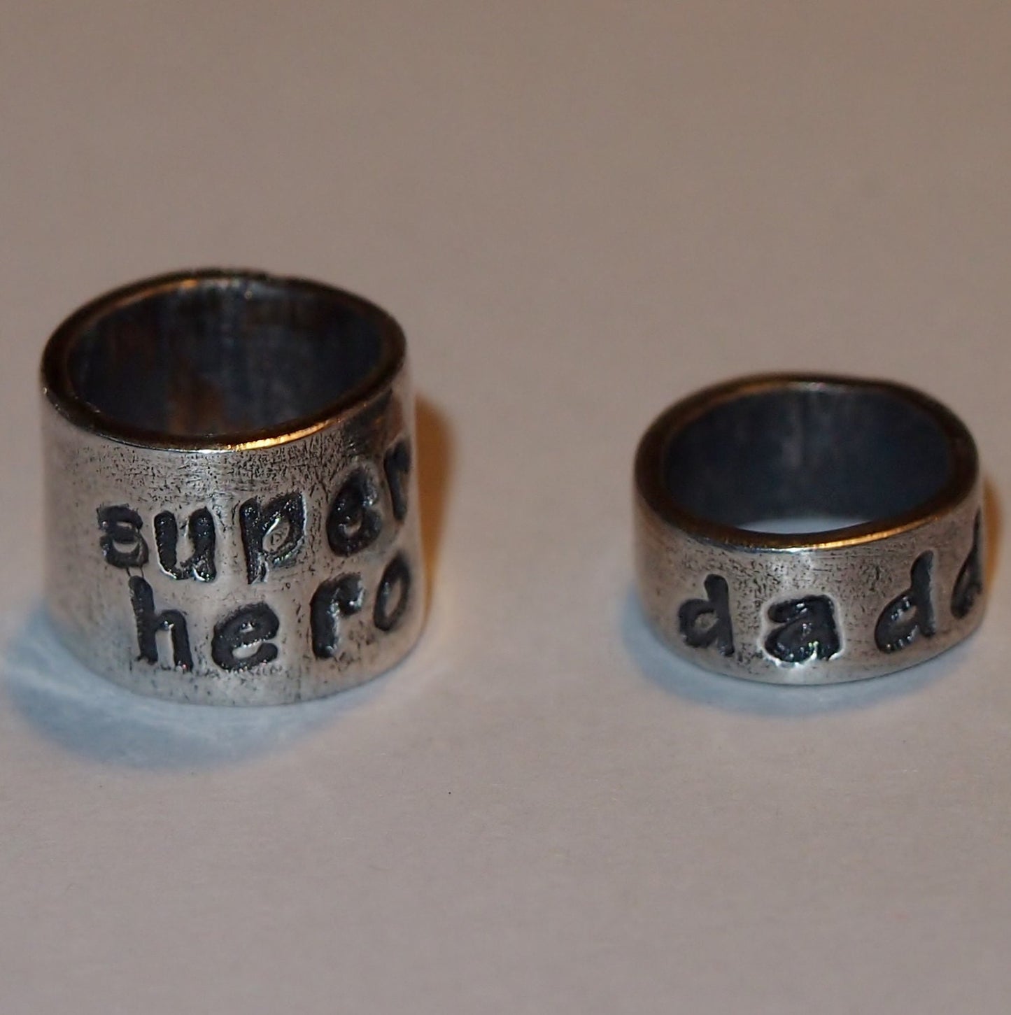 A lovely plaited leather charm bead bracelet. Handmade personalised beads in fine silver with sterling silver clasp