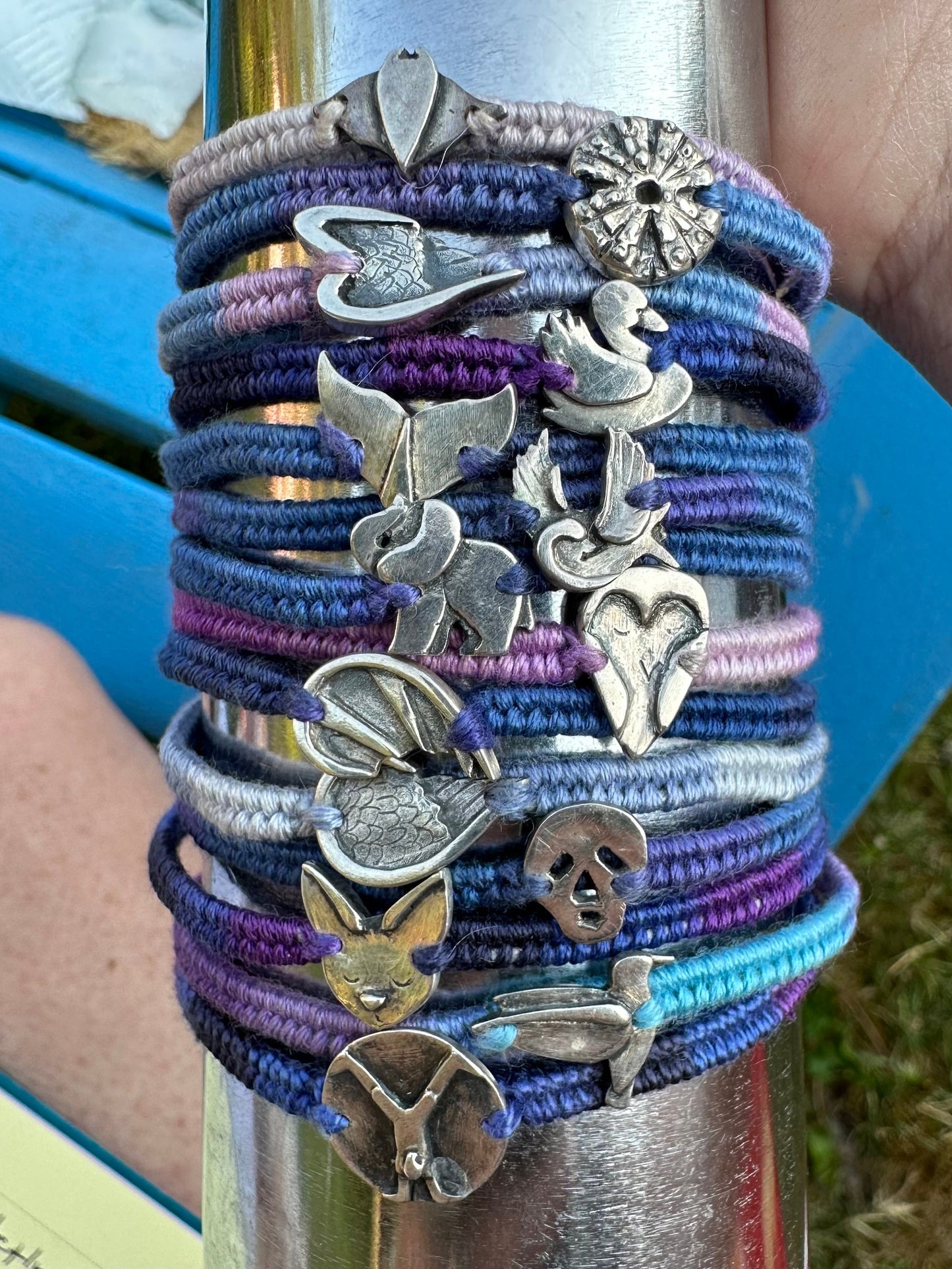 A lovely unique fine silver devil wing on a gorgeous deep blue leather, cotton and sterling silver friendship bracelet.