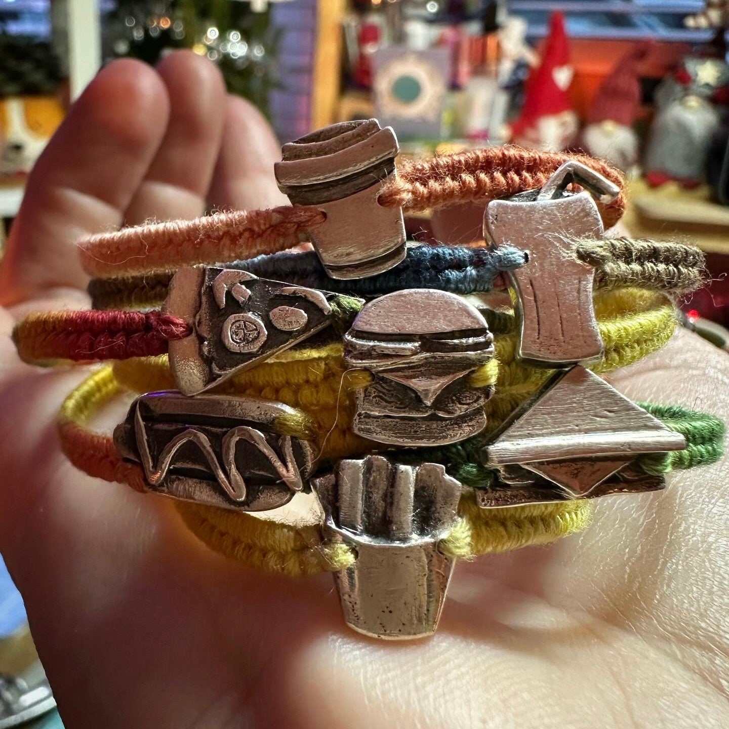 A unique tiny fine silver burger charm on a beautiful yellow leather, sterling silver and cotton friendship bracelet.