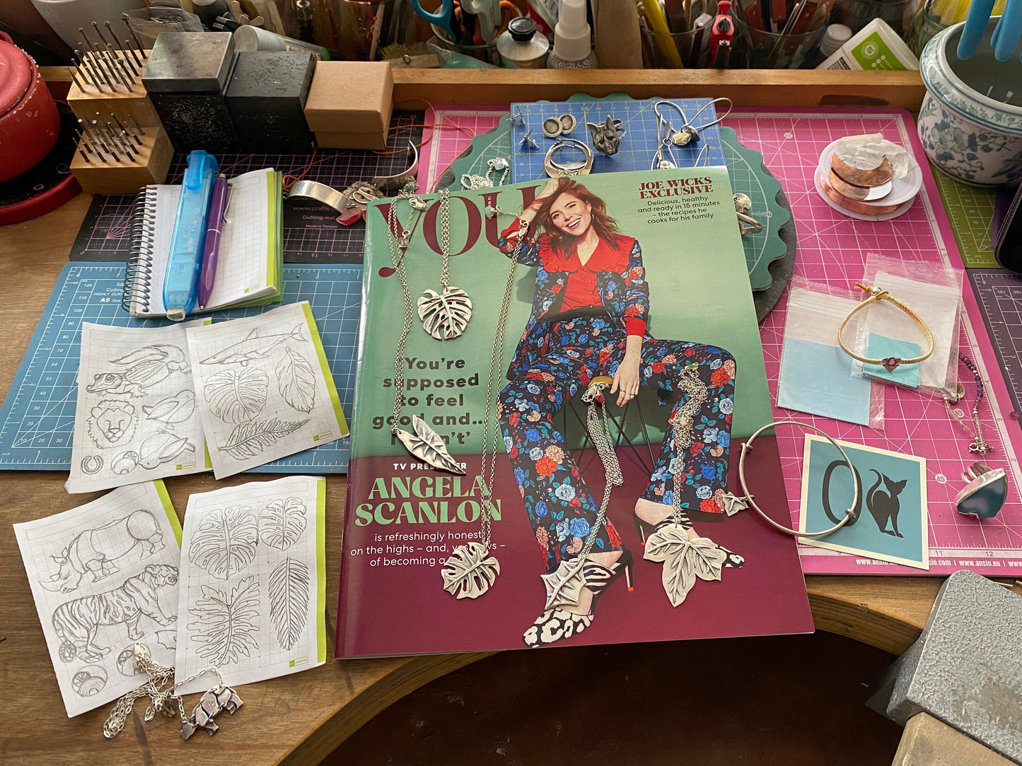 A beautiful handmade fine silver bunny rabbit pendant on a sterling silver chain.