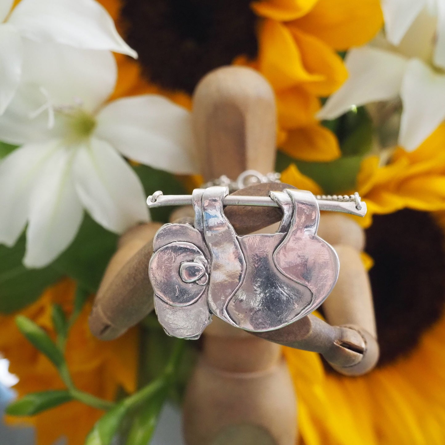 A gorgeous simple koala handmade in fine silver hanging from his little sterling branch on a sterling silver chain.