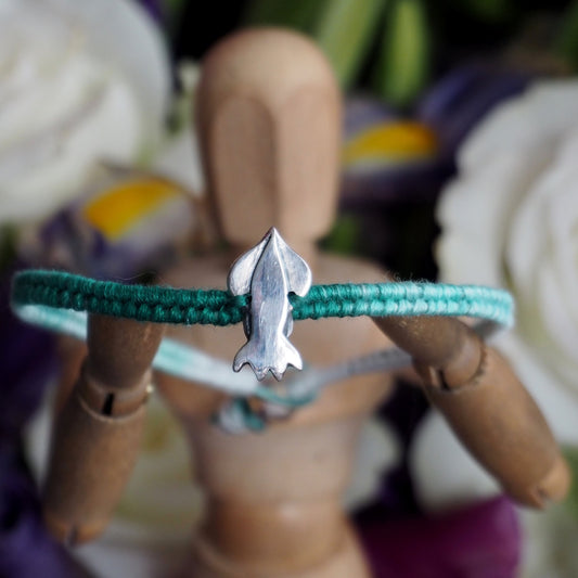 A lovely green leather and cotton friendship bracelet with fine silver handmade squid.