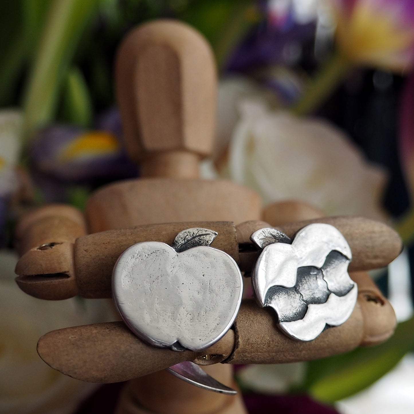 A unique pair of beautiful Apple and Core fine silver and sterling silver cufflinks. The back is a sweet little apple leaf.