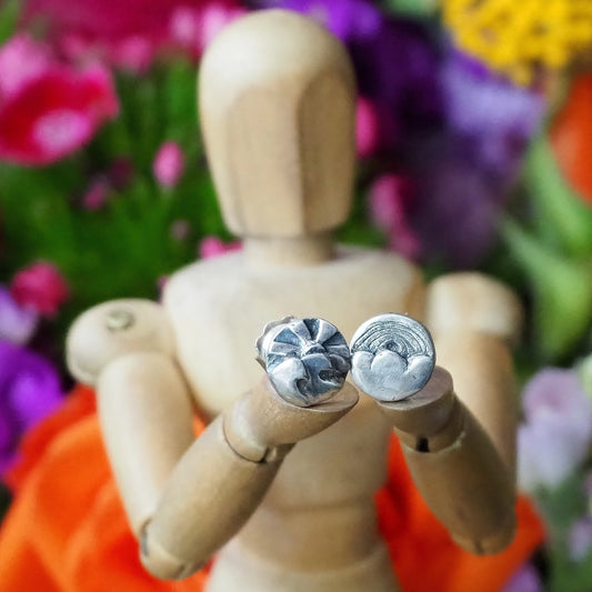 A gorgeous pair of tiny fine landscape stud earrings on sterling silver posts.