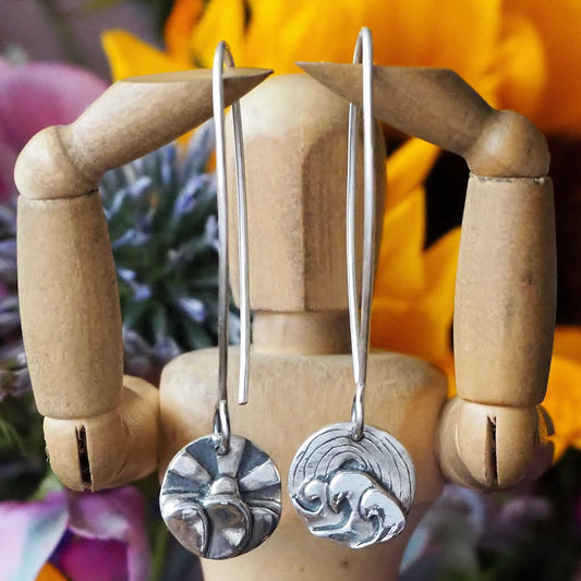 A beautiful pair of handmade fine silver sun, rainbow, waves and cloud earrings on long 925 sterling silver wires