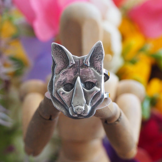 A beautiful Fox head ring made from eco friendly fine silver with an adjustable sterling silver band.