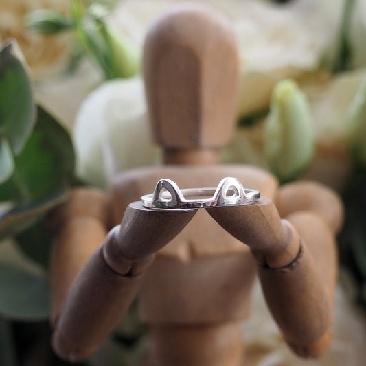 A purrfectly gorgeous simple sterling silver square wire ring with cat ears.