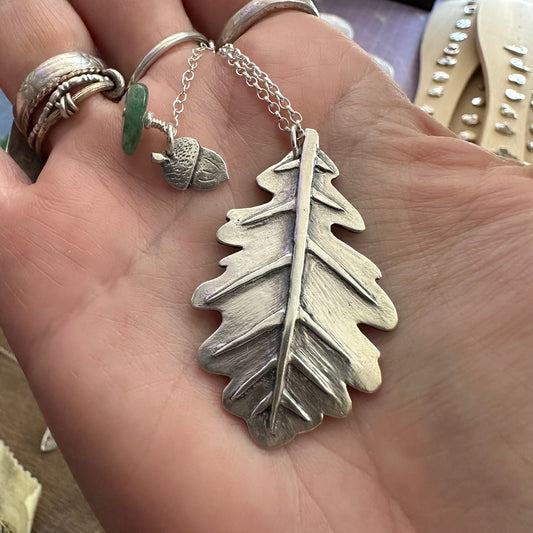 A lovely unique large oak leaf and acorn handmade in eco friendly fine silver on a sterling silver necklace.