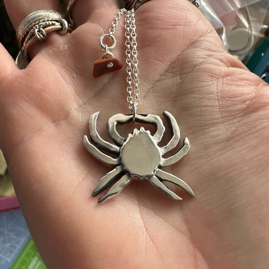 A beautiful simple spider Cornish crab  handmade in fine silver pendant on a sterling silver chain.