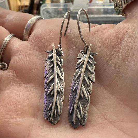 A wonderful pair of handmade fine silver feathers on sterling silver wires