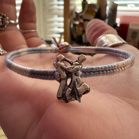 A lovely ballroom dancing couple handmade in fine silver on a soft grey/blue faded leather, cotton and sterling silver friendship bracelet.