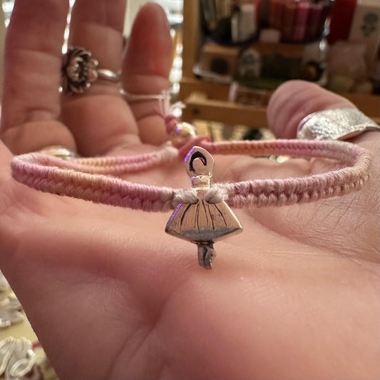 A beautiful solo ballet dancer handmade in fine silver on a baby pinks leather, sterling silver and cotton friendship bracelet…