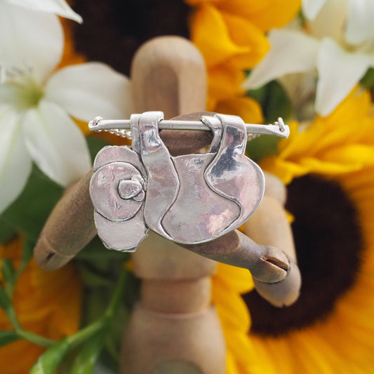 A gorgeous simple koala handmade in fine silver hanging from his little sterling branch on a sterling silver chain.