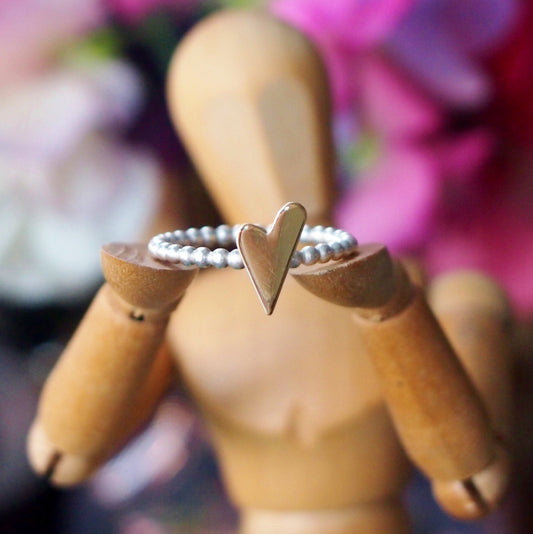 A cute dainty sterling silver and 9ct yellow gold heart stacking ring.