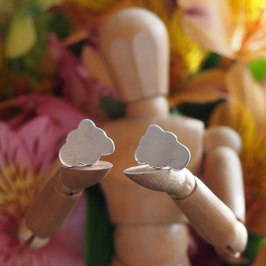 A pair of beautiful simple cloud stud earrings, handmade in solid silver.